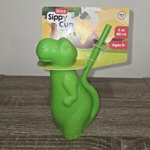 New Brite Concepts Green Dino Sippy Cup 6 oz. The New Brite Concepts Green Dino